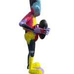 right side view of a multi-colored robot statue holding a heart