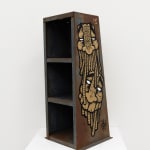 Metal shelf with GATS character painted on the sides and a metal chain painted on the back