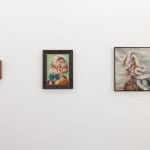 installation shot of three paintings of various size