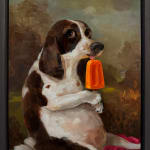 dog licking an orange popsicle