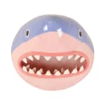 sculpture of a shark head with its teeth showing