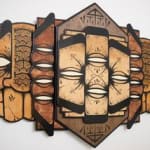 GATS painting on wood of face