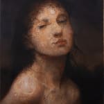 Portrait of a figure under water with rain droplets