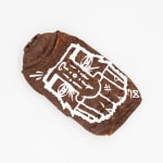 Flattened and rusted spray can with GATS character painted in white