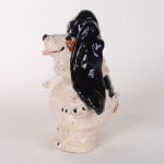 Katie Kimmel - ceramic sculpture of a black and white basset hound standing on its hind legs