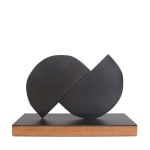Scott Albrecht - iron sculpture, abstract half circles splitting
