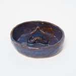 Jocelyn Tsaih's sculpture of a blue bowl with a face the middle