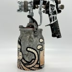 metal spray paint can decorated with GATS figure