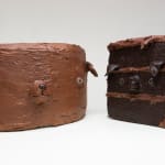 Stephen Morrison sculture of chocolate cake with dog face and slice of cake with dog face