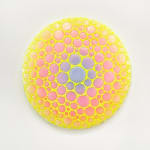 Circular sculpture by Dan Lam with pink and purple circles and tiny bright yellow spikes