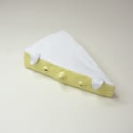 Stephen Morrison "Camembert" ceramic sculpture of realistic brie cheese with eyes and mouth