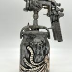 metal spray paint can decorated with GATS symbols