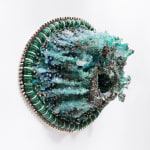 Lucien Shaprio's wall hanging sculpture made of various items and broken glass