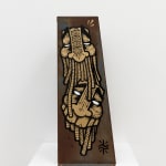 Metal shelf with GATS character painted on the sides and a metal chain painted on the back