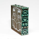 vintage filing cabinet adorned with designs of a geometric figured