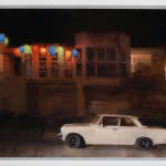 Kim Cogan - Painting of a street at night, a white car parked on street as the front view and side walk with buildings as background, decorative lights of red, blue, yellow and green liut up on the left side of the painting