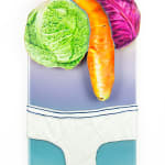Painting of a green cabbage, a carrot and a purple cabbage above a white pair of underwear briefs.