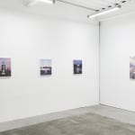 Installation view of Scott Listfield's exhibition "Extinction Stories," at Harman Projects, San Francisco. From left to right: "Mojave Phone Booth," "The Delivery," "Coyote City," and "Cybertruck on Fire"