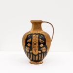 GATS character painted on a metal brown vase in black