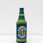 Paa Joe's sculpture of beer bottled turned into a coffin