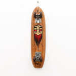Brown wooden vintage skateboard with a light brown and red beard GATS character painted on the bottom of the board