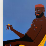 Man with red hair sitting in yellow chair holding a coin by Jillian Evelyn
