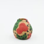 Jackie Brown small ceramic pinch put with green and pink pattern painted on as well as leopard print