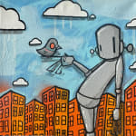 grey robot holding a pigeon bird on his finger against a background of orange buildings and blue sky with clouds