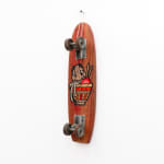 Brown wooden vintage skateboard with GATS character in a bowl of ramen with chopsticks painted on the bottom of the board