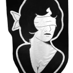 embroidered black and white banner of a blindfolded woman