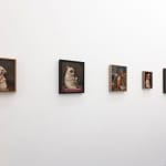 Install photo of Alison Friend's paintings hanging on a white wall