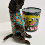 Mark Gagnon - sculptures of a black dog standing on its hind legs and a can with image of a dog head and the text "CHUNKYS" below