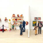 inside portion of dome sculpture with small figurines in a museum by Abigail Goldman