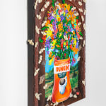 Nic Dyer's painting of colorful flowers displayed in a Dunkin Doughnuts can
