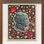 Collage of various cutout flowers arranged around a statue head of a profile of a woman on a black background