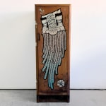 A freestanding wood cabinet with a painted illustration of a masculine face - with a gradient from white to pink to blue - with a beard covered in small details/designs, outlined in black.