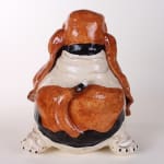 Katie Kimmel - ceramic sculpture of a brown and white basset hound, its body is rounded like a balloon