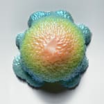 Sculpture by Dan Lam of a slimy drippy sphere