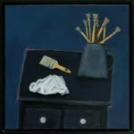 Painting of paint brushes on a black desk on a dark blue background in a black frame