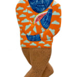 Sculpture of a man riding a skateboard holding a half of a watermelon. His face and beanie and blue and he is wearing an orange sweater with light blue clouds.