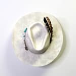 Brock DeBoer white cowboy hat sculpture with feather and turquoise accessories