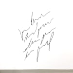 Diagonally slanted abstract scribble text resembling a paragraph by Arnaud Vidricaire made of burnt laser cut wood hanging on a wall above a grey floor