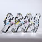 Cubic Dylan Martinez glass sculpture refracting visible light frequencies