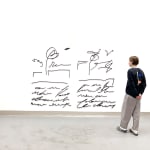 Man standing next to Black scribble abstract artwork resembling a math equation by Arnaud Vidricaire made of burnt laser cut wood in the form of a diptych