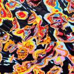 alternate detail view of Jason Hallman excavated painting with black background and multi colored excavation spots with red blue green and yellow