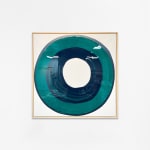 Ted Collier circle series painting with green circle on white canvas hanging on a white wall