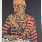 A portrait of a man. He has dark bronze skin. He is bald and is wearing a striped black and red long sleeve shirt. He is staring blankly ahead and is smoking a pipe. His right arm is resting on a mesh table. You only see him from the torso up. The backgro