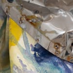 Detail view of multimedia wall sculpture