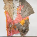 Large wall-hanging fabric object with many flecks of color, folded and rumpled