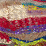 A close-up detail of a cacophonous composition in multi-colored fibers stretched across a redwood frame as one would stretch a painting. The fibers are knit at varying thicknesses so that in places one can see through the stitches to the wall behind. The composition has a wave-like pattern with many fractal fields of varying colors
